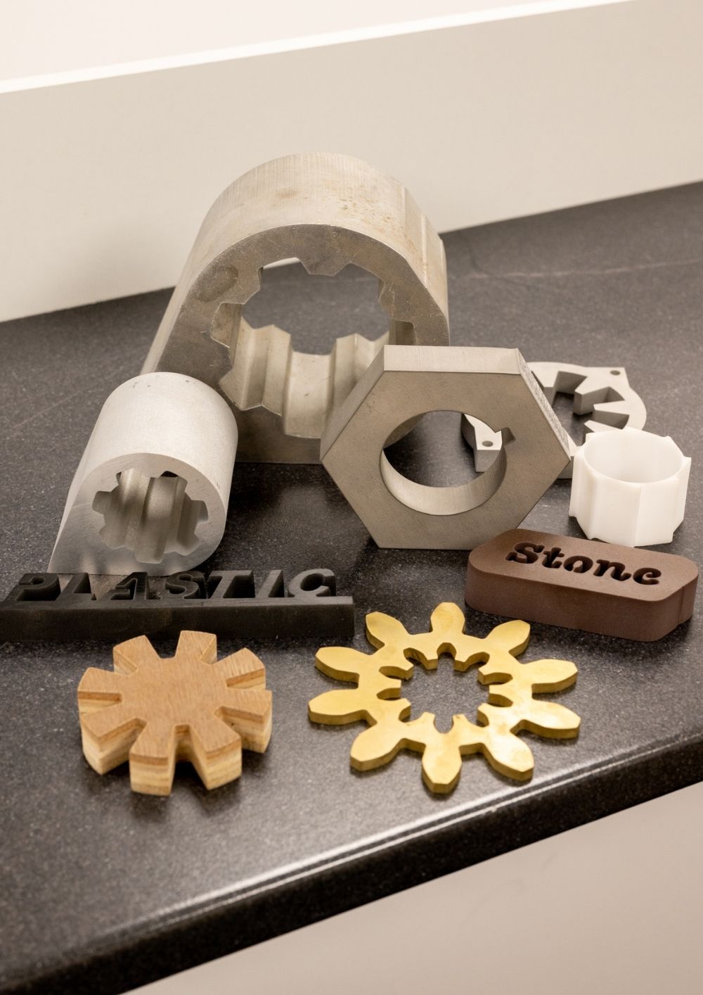 a rang of sample materials cut by Northwest Waterjets