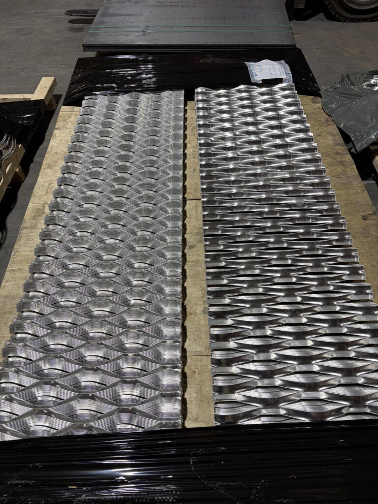Repeat production batch of precision cut metal components